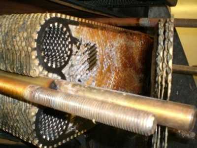 fouled heat exchanger plate on a fresh water generator